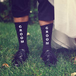 Wedding Groom Personalised Black Socks<br><div class="desc">Dress the men of your wedding party with coordinating personalised socks. "Groom" is written down the front of the socks in bold white typography. Personalise these souvenir keepsake socks with your first names and wedding date in simple white typography on the lower inside.</div>