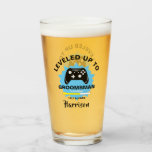 Wedding Groomsman Levelled Up Gamer Fun Glass<br><div class="desc">A modern groomsman gift idea for those who love playing computer generated games,  featuring two games consoles and a humour statement "Levelled Up To Groomsman" Just customise with a personal name for that extra special touch at no extra cost.</div>