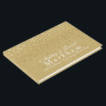 Wedding Guest Book-50th Anniversary Guest Book<br><div class="desc">This guest book is shown in a custom matte Gold colour [ not GOLD or metallic gold ] with a curtain of Golden-Tan coloured petite stars on both front and back are splattered all over this guest book. Front and spine has text reading your two personalised names in a fancy...</div>