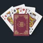 Wedding Monogram Classic Gold Frame Burgundy Playing Cards<br><div class="desc">Ornate, classical frame in gold tones with burgundy background. Replace the sample monogram with your own for a personalised gift. Makes a wonderful gift for anyone who enjoys classic, timeless, traditional designs. The background colour is changeable: Simple click on the “Customise” button and pick a hue from the “Select a...</div>