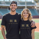 Wedding Monogram Personalised Bride And Groom T-Shirt<br><div class="desc">Celebrate your union in opulent style with our Wedding Monogram Personalised Bride and Groom T-Shirt, a luxurious addition to your wedding wardrobe. This elegant piece is designed for those seeking a touch of glamour, featuring a black and gold colour scheme that exudes sophistication. The minimalist wedding design, including the bride...</div>