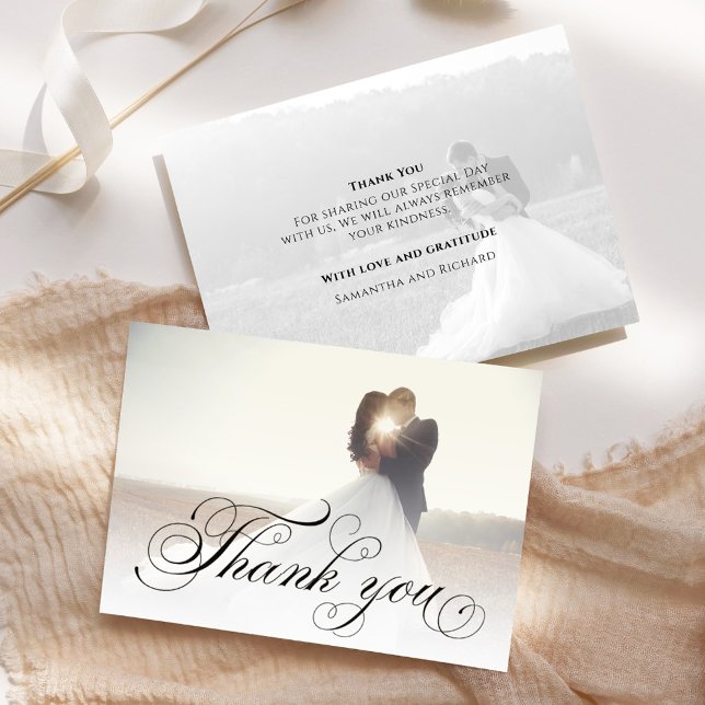 Wedding Photo Calligraphy Script Elegant Thank You Card (Elegant calligraphy script wedding thank you card with a 2-photo template. )