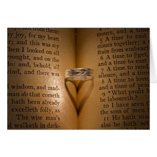 Wedding Ring Heart Shadow on Bible