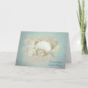 Wedding rings and seashells card