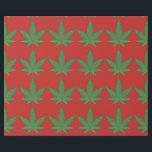 Weed Leaf Christmas Wrapping Paper<br><div class="desc">Weed Leaf Christmas Paper with the green weed leaf on red background makes your gift stand out with all the cool people on your Christmas list. Some may think it naughty but Santa thinks it's nice. What do you think is in his pipe?</div>