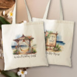 Weekend Beach Wedding Personalised Welcome Tote Bag<br><div class="desc">Beach themed personalised weekend wedding welcome tote bag for guests. This charming design features a watercolor scene of a wooden wedding ceremony pagoda, on an oceanfront beach, draped with voiles and tropical flowers. On the otherside there is rustic boho welcome sign which you can also personalise. Perfect for a casual...</div>