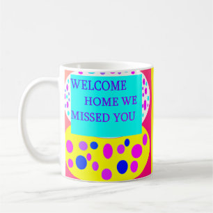Welcome home message on  coffee mug
