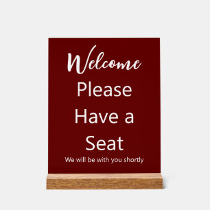 Welcome Please Have a Seat Dark Red and White Text Acrylic Sign