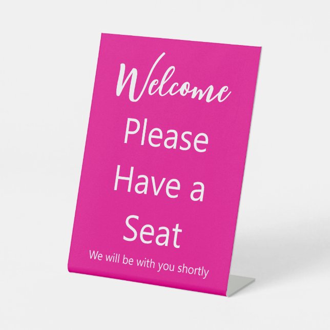 Welcome Please Have a Seat Hot Pink and White Text Pedestal Sign (Front)