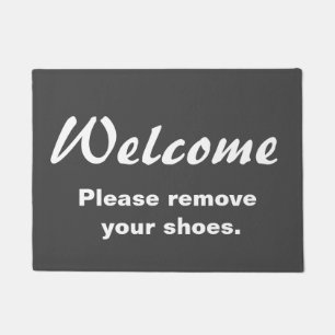 Welcome. Please remove your shoes. Doormat