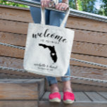 Welcome to Florida | State Silhouette Wedding Tote Bag<br><div class="desc">Give your guests a warm welcome to your Florida wedding with a bag full of snacks and treats personalised with the state where you're getting married and the bride and groom's names and wedding date. Design features "welcome" in modern handwritten calligraphy script along with bride and groom's names and wedding...</div>