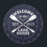 Welcome to the Lake House | Rustic Canoe Paddles Dartboard<br><div class="desc">Spend your leisurely lakeside hours playing darts with this fun,  unique dartboard. Design features a midnight blue background with "Welcome to the Lake House" in rustic block text and two crossed canoe paddles. Customise with the year established for an awesome housewarming present or gift for your weekend hosts!</div>