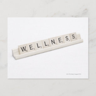 Wellness Spelled On A Word Board Game. Postcard