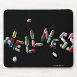 'WELLNESS' written with pills Mouse Mat