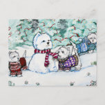 West Highland White Terrier Snowman Postcard<br><div class="desc">A Winter wonderland of Westies for the holiday season. Finishing up their Snow Dog,  these West Highland White Terriers set the holiday tone. Original design by Cherry O'Neill for Tail End Productions. Perfect Christmas gifts for dog lovers.</div>