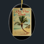 West Palm Beach Palm Tree Vintage Travel Ceramic Tree Decoration<br><div class="desc">A uniquely retro mid-century modern West Palm Beach Florida art print in vintage travel poster style. It features a curved palm tree on sandy beach with ocean under a blue cloudy sky.</div>