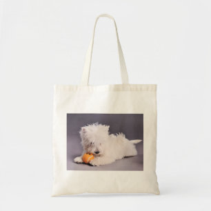 Westie puppy with tennis ball tote bag