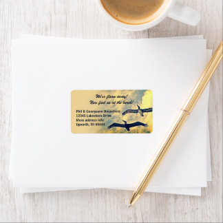 We've flown away! Flying pelicans new address Label