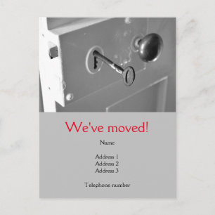 We've Moved Postcard with an old door & key