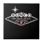What Happens At Bunco Stays At Bunco Fun Tile<br><div class="desc">Fun and colourful vintage style graphic art design inspired by Bunco players.  What Happens At Bunco Stays At Bunco features a Vegas style neon sign design that includes tow red Bunco dice.  Bunco products are great gifts or prizes.  Background colour can be changed to your own favourite colour.</div>