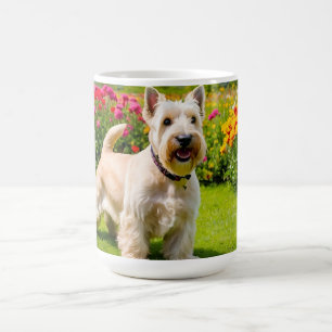Wheaten Scottish Terrier playing in Flowers Grass Coffee Mug