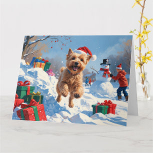 Wheaten Terrier Running in Snow with Christmas Hat Card
