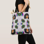 Whimsical Boho Owl & Tropical Monstera Leaf Tote Bag<br><div class="desc">Embrace a blend of mystical charm and tropical vibes with this unique surface pattern. Featuring a rhythmic arrangement of wise owls nestled in boho-style arches alongside iridescent owls and lush Monstera leaves, this design is perfect for those who love eclectic and modern nature-inspired aesthetics. Whether you are looking to create...</div>