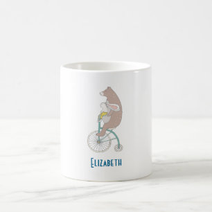 Whimsical Bunny and Bear Riding a Bike Together Coffee Mug