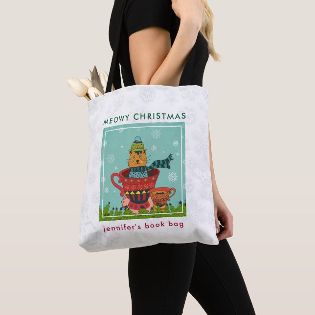 Whimsical Cat Sitting in a Teacup Christmas Tote Bag (Close Up)