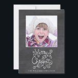 Whimsical Christmas Chalkboard Calligraphy Photo Holiday Card<br><div class="desc">Spread some holiday cheer with this fun holiday photo card featuring a whimsical Merry Christmas Typography/Calligraphy design, your photo and name set against a black chalkboard background. The backside features another photo and your custom holiday message. Trendy and fun, yet simple and classic, it's sure to make friends and family...</div>