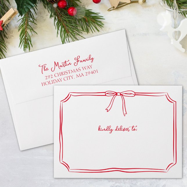 Whimsical Christmas | Red Festive Bow Holiday Card Envelope (Add a touch of elegance to your christmas mail with this envelope featuring a hand-drawn bow frame.)