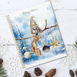 Whimsical Farmhouse Winter Lady Gnome on Blue Planner<br><div class="desc">Whimsical Farmhouse Winter Lady Gnome on Blue Planner - Unique Design, Watercolor Illustration, Customisable Name, and More. The Whimsical Farmhouse Winter Lady Gnome on Blue Planner is the perfect solution for spreading holiday cheer. This unique planner boasts a charming lady gnome seated on a branch, surrounded by Christmas decoration stars,...</div>