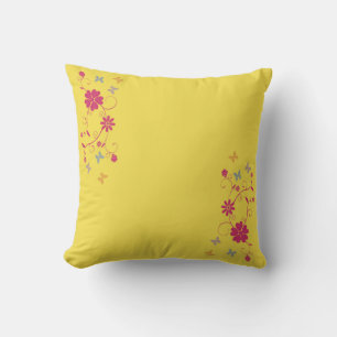 Whimsical Floral and Butterfly Accents on Yellow Cushion