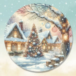 Whimsical Folk Village Christmas Classic Round Sticker<br><div class="desc">Pretty whimsical village all festive with Christmas lights and decorations in pink and blue to give the little town a vintage enchanted cosy vibe.</div>