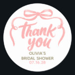 Whimsical Pink Bow Bridal Shower Thank You  Classic Round Sticker<br><div class="desc">Looking to give your party favors and gifts that perfect finishing touch? These pink curly ribbon bow thank you stickers are just what you need! Featuring a whimsical hand-drawn watercolor bow paired with handwritten-style script,  they bring a playful and personal vibe to any celebration.</div>