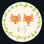 Whimsical Woodland Foxes Ivory wedding Classic Round Sticker<br><div class="desc">This charming wedding invitation collection features a well-dressed fox couple surrounded by a garland of hand-drawn leaves in a rustic wreath arrangement.</div>