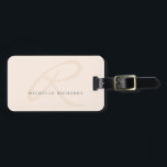 Whisper Pink Elegant Minimalist Monogram Luggage Tag<br><div class="desc">An elegant monogram logo is featured on this chic pale pink luggage tag with minimalist appeal. Simply edit the sample text with your details. You can add or remove lines of text as needed to suit your requirements. If you edit the monogram and find it needs re-centring, scroll to the...</div>