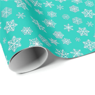 White 3-d snowflakes on a turquoise background wrapping paper
