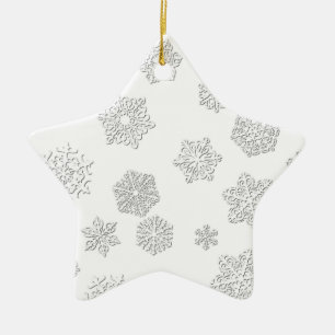 White 3-d snowflakes on a white background ceramic tree decoration
