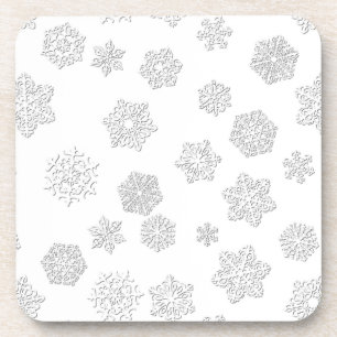 White 3-d snowflakes on a white background coaster
