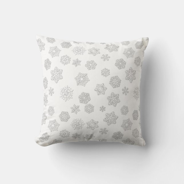 White 3-d snowflakes on a white background cushion (Front)