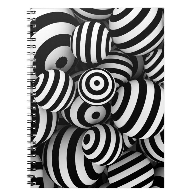White abstract background with balls and black lin notebook (Front)