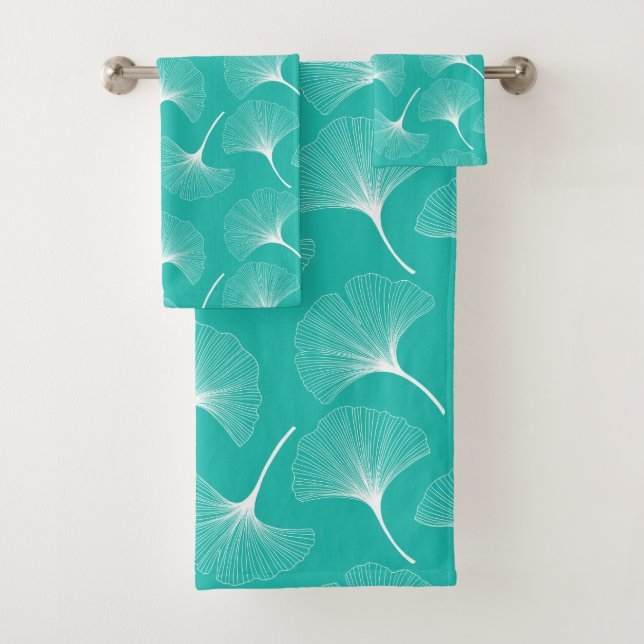 White abstract leaves pattern on mint-green bath towel set (Insitu)