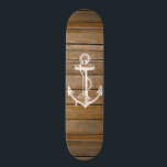 White anchor vintage rustic brown wood skateboard<br><div class="desc">A white nautical anchor and vintage rustic brown wood panels.A popular design on wood texture background. The perfect unique gift for every occasion</div>