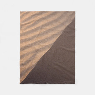 White and black stripe textile fleece blanket