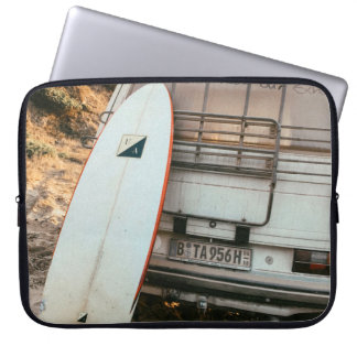 White and black surfboard laptop sleeve
