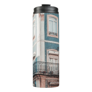 WHITE AND BLUE CONCRETE BUILDING THERMAL TUMBLER