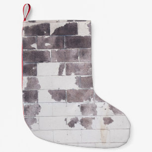 White and brown concrete wall small christmas stocking