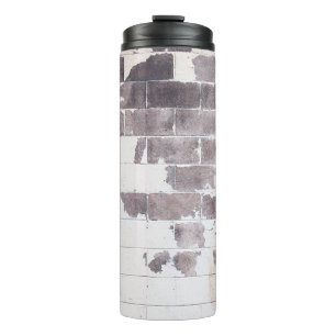 White and brown concrete wall thermal tumbler