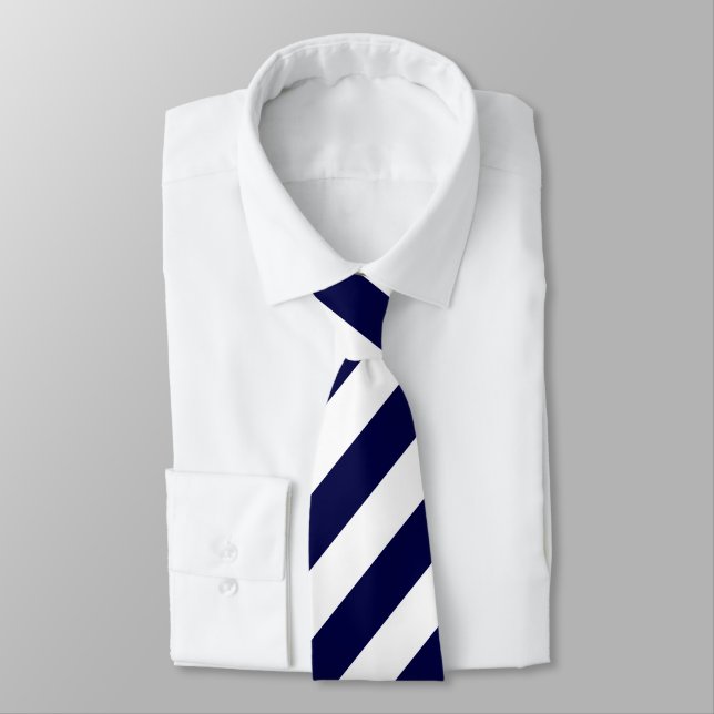 White and Dark Blue Diagonally-Striped Tie (Tied)